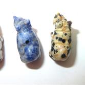 Image for Gemstone hand carved Rhino Beads miniatures set of 4